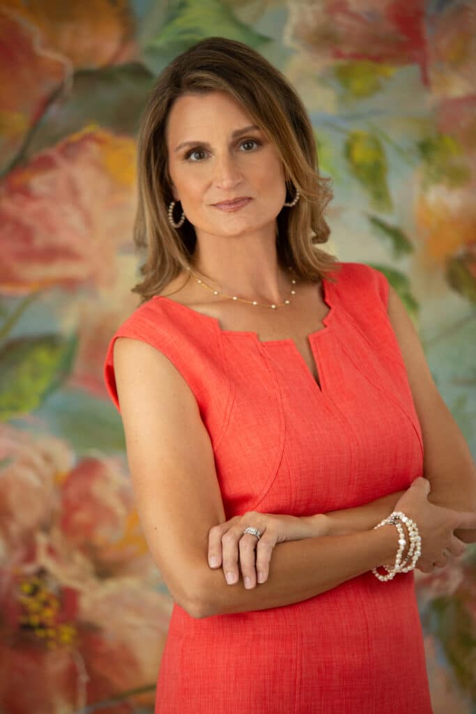 Professional headshot of a Howard County small business owner photographed in a calm studio setting